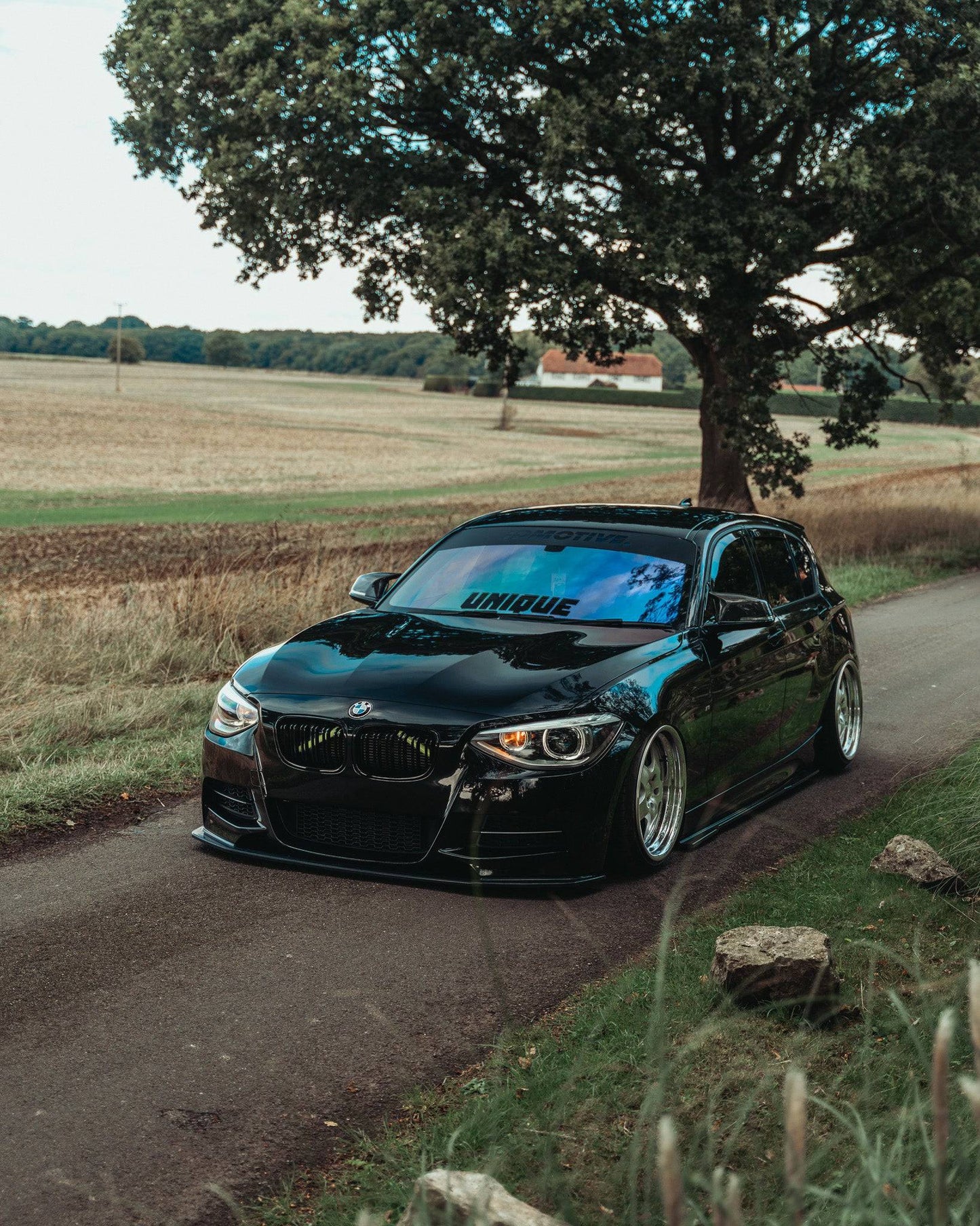 BMW 1 Series F20 Pre - LCI EVO - 1 Gloss Black Front Splitter by ZAERO (2011 - 2015) - Evolve Automotive